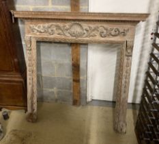 A Georgian carved pine fire surround, width 143cm, height 135cm (aperture width 96cm, height