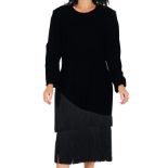 A vintage Lanvin black velvet dress with fringe, long sleeve sheath with a crew neckline semi fitted