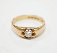 A George V 18ct gold and claw set solitaire diamond ring, size W, gross weight 7.2 grams.***