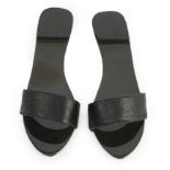 A pair of Hermès black pony skin and lacquer mules, Size 39***CONDITION REPORT***A few small chips