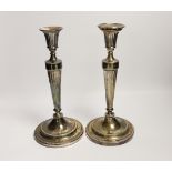 A pair of George III silver candlesticks, with waisted fluted stems, John Winter & Co, Sheffield,