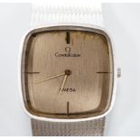 A gentleman's 1970's 750 white metal Omega Constellation manual wind dress wrist watch, on