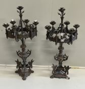 A pair of Gothic style seven branch cast metal candelabra, height 80cm***CONDITION REPORT***PLEASE
