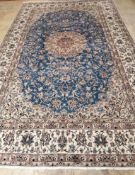 A Nain blue ground carpet, 355 x 215cm***CONDITION REPORT***PLEASE NOTE:- Prospective buyers are
