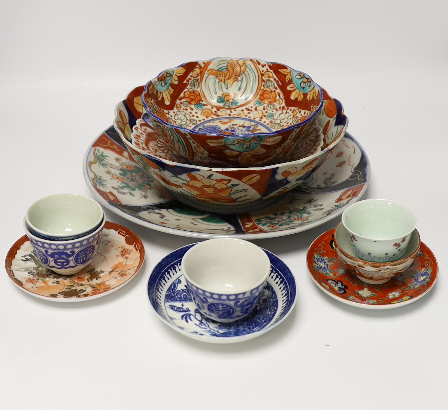 A group of Japanese Imari and kutani together with a Worcester blue and white saucer and a Chinese