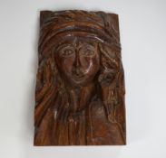 A small carved oak figure of a maiden, 28cms high***CONDITION REPORT***PLEASE NOTE:- Prospective
