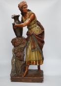 A painted plaster figure of Rebecca at the well, 58cm high***CONDITION REPORT***PLEASE NOTE:-