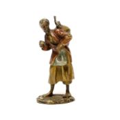 A cold painted bronze figure of an Arab coffee seller, 5.5 cm high***CONDITION REPORT***PLEASE