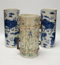 A pair of Chinese blue and white cylindrical hat stands, 29cm high and a Japanese porcelain vase