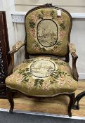 A French carved walnut tapestry fauteuil, width 64cm, depth 64cm, height 96cm***CONDITION REPORT***