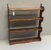 A Victorian pitch pine four tier wall bracket, width 75cm, depth 21cm, height 87cm***CONDITION