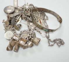 A silver charm bracelet and a small quantity of other silver and white metal jewellery.***