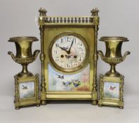 A French Aesthetic period brass and porcelain panelled clock garniture, clock 34cm high***