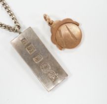 A 9ct gold swivelling masonic pendant, 12.3 grams and a silver ingot pendant, on a 925 chain.***