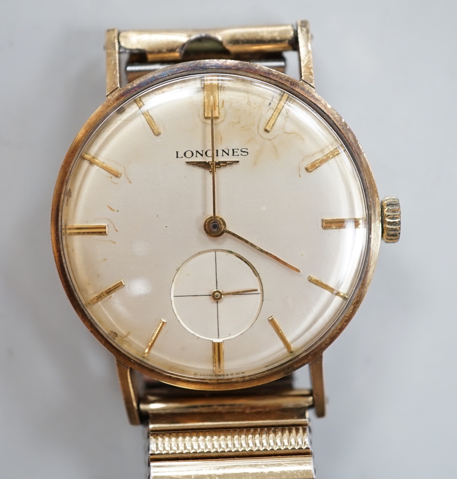 A gentleman's 9ct. gold Longines manual wind wrist watch, with engraved inscription, on an - Image 2 of 4