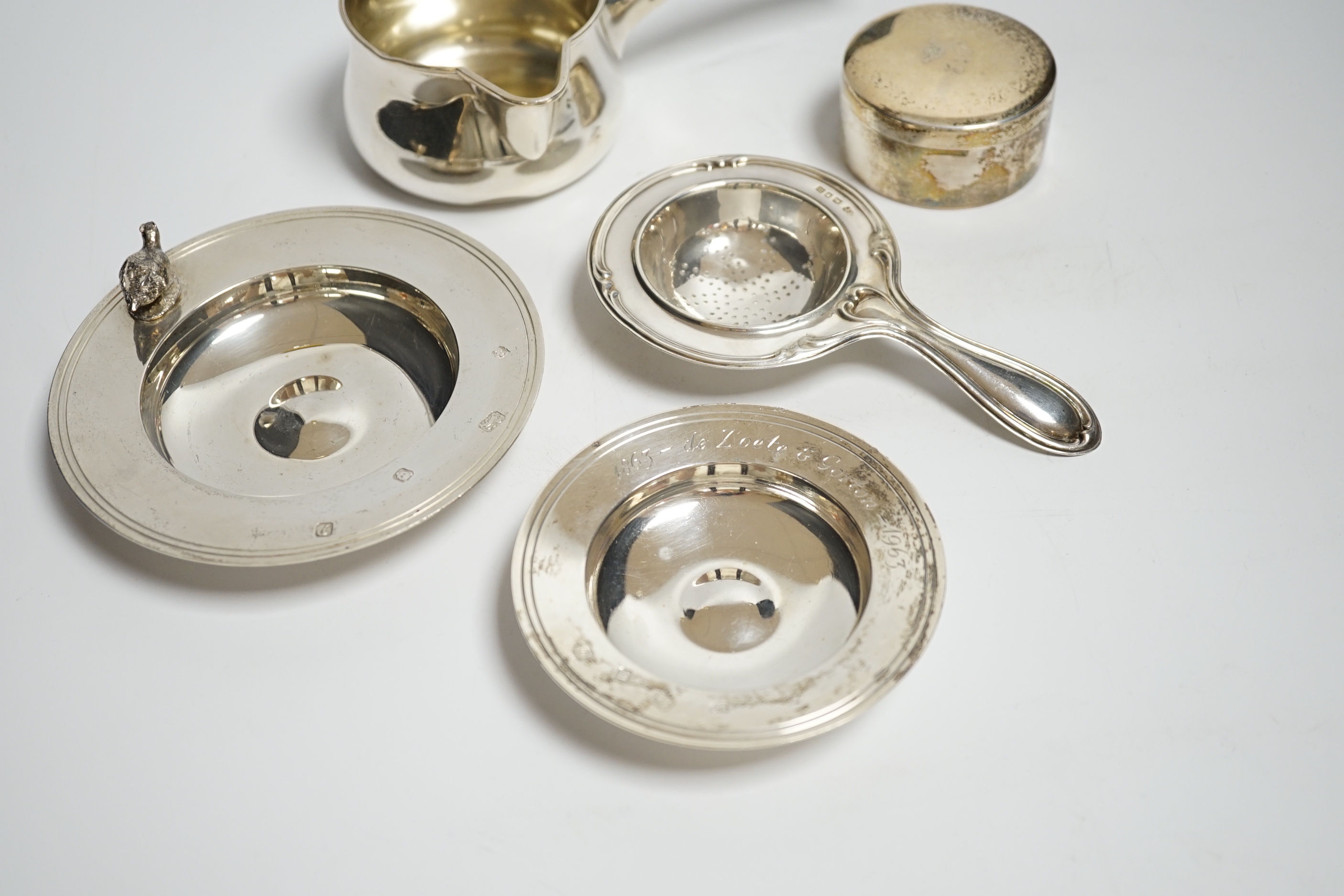 Two small modern silver dishes, a silver tea strainer and two Scandinavian items.***CONDITION - Image 3 of 5