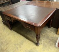 A late Victorian mahogany and cedar kneehole writing table, width 137cm, depth 107cm, height