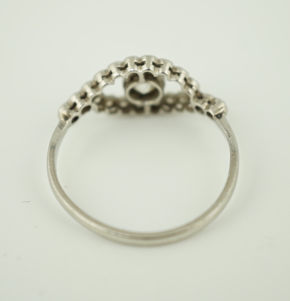 A white metal and single stone elliptical shaped ring, with diamond set border and shoulders, size - Image 5 of 5