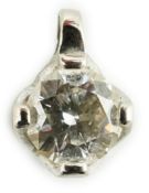 A modern 18ct white gold and solitaire diamond set pendant, gross weight 0.4 grams, stone diameter