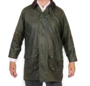 A green 1990's Barbour Gamefair jacket, brown corduroy collar, green tartan lining, size: C38/