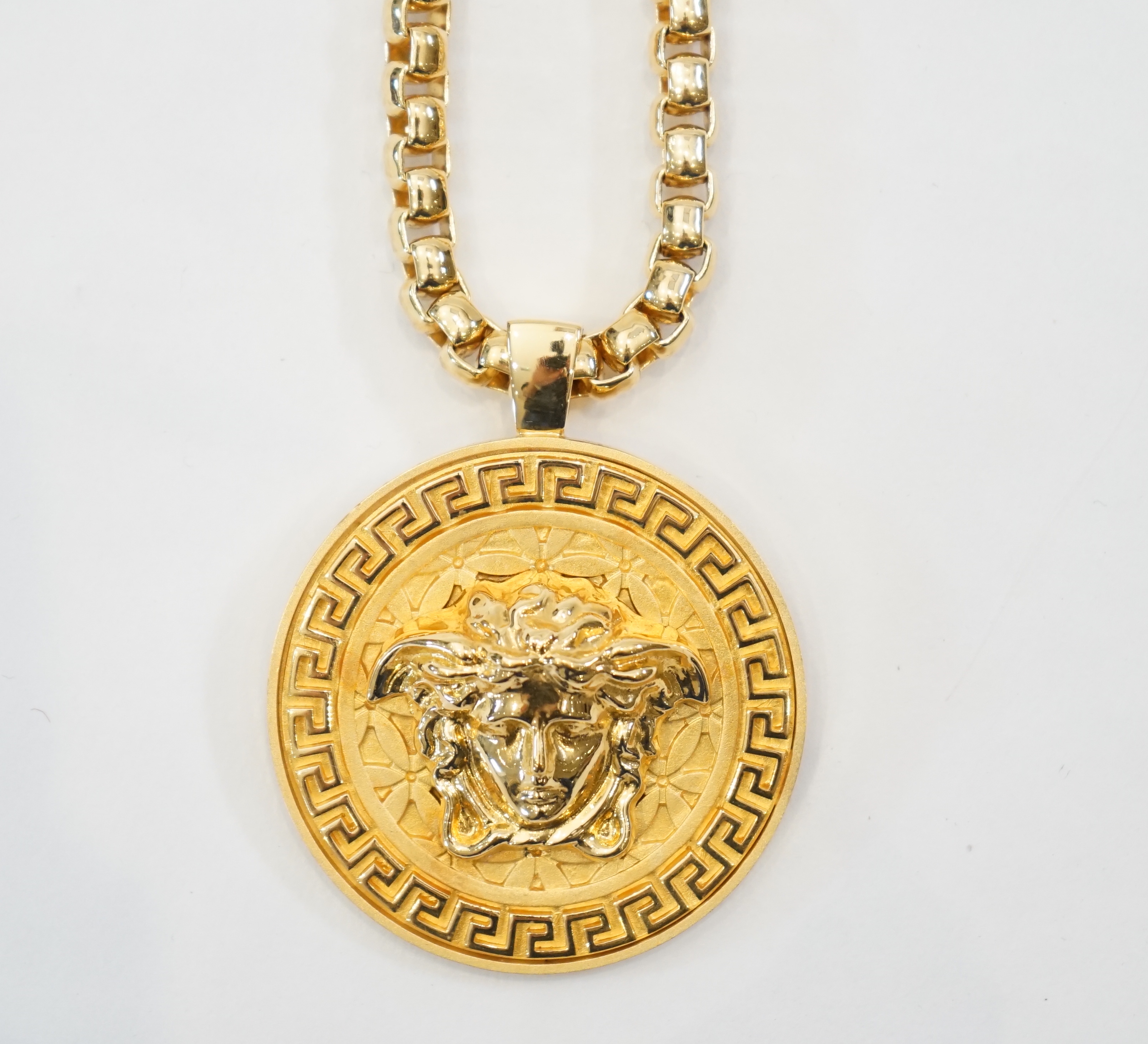 A Versace Medusa gold Greca medallion coin pendant with chunky rapper necklace, in original white - Image 6 of 7