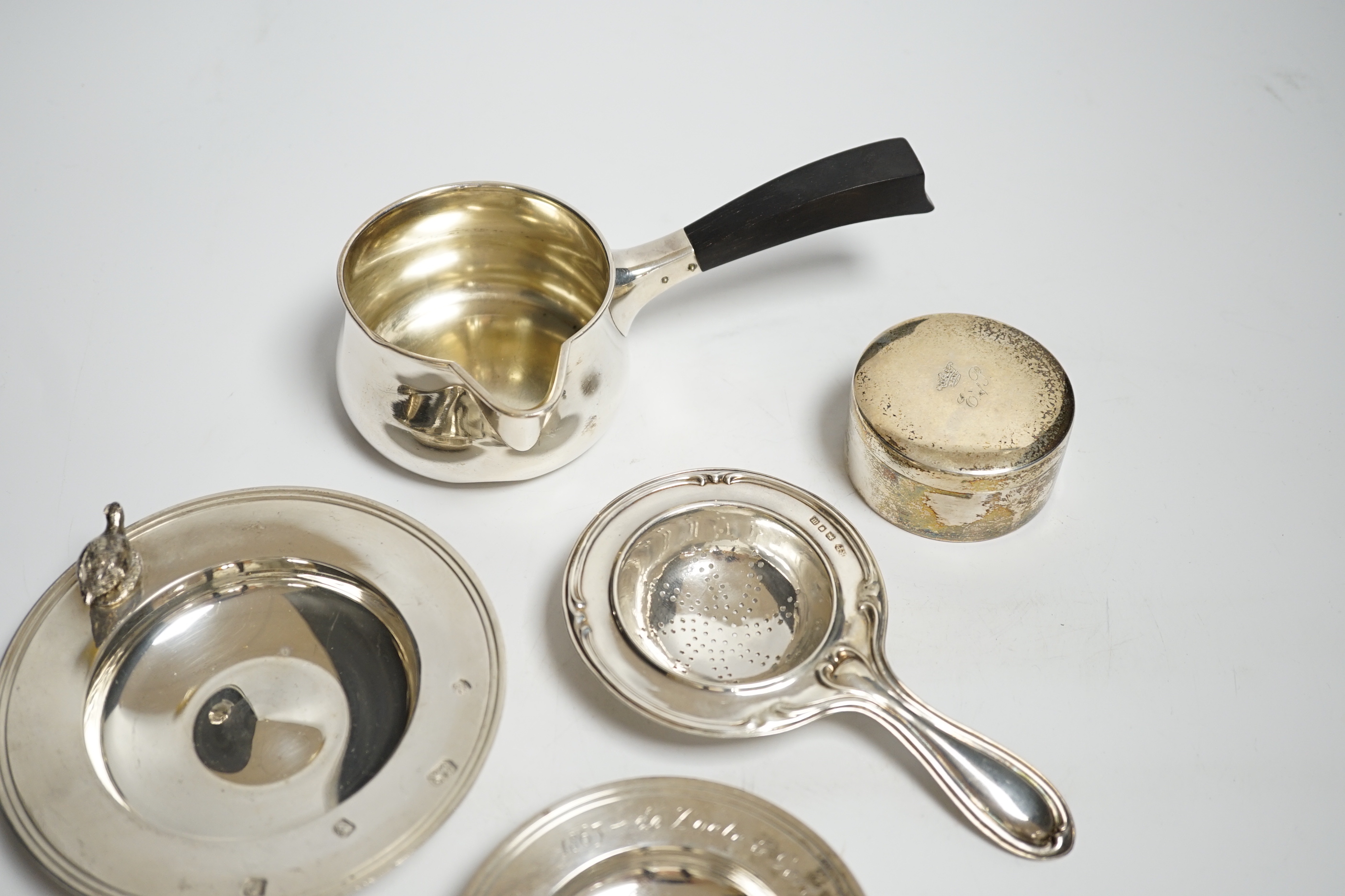 Two small modern silver dishes, a silver tea strainer and two Scandinavian items.***CONDITION - Image 2 of 5