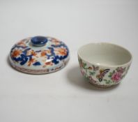 A Chinese famille rose bowl decorated with butterflies and birds together with an Imari cover,