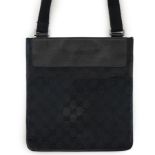 A Gucci black GG canvas crossbody bag features a canvas body with leather trim, flat strap, open