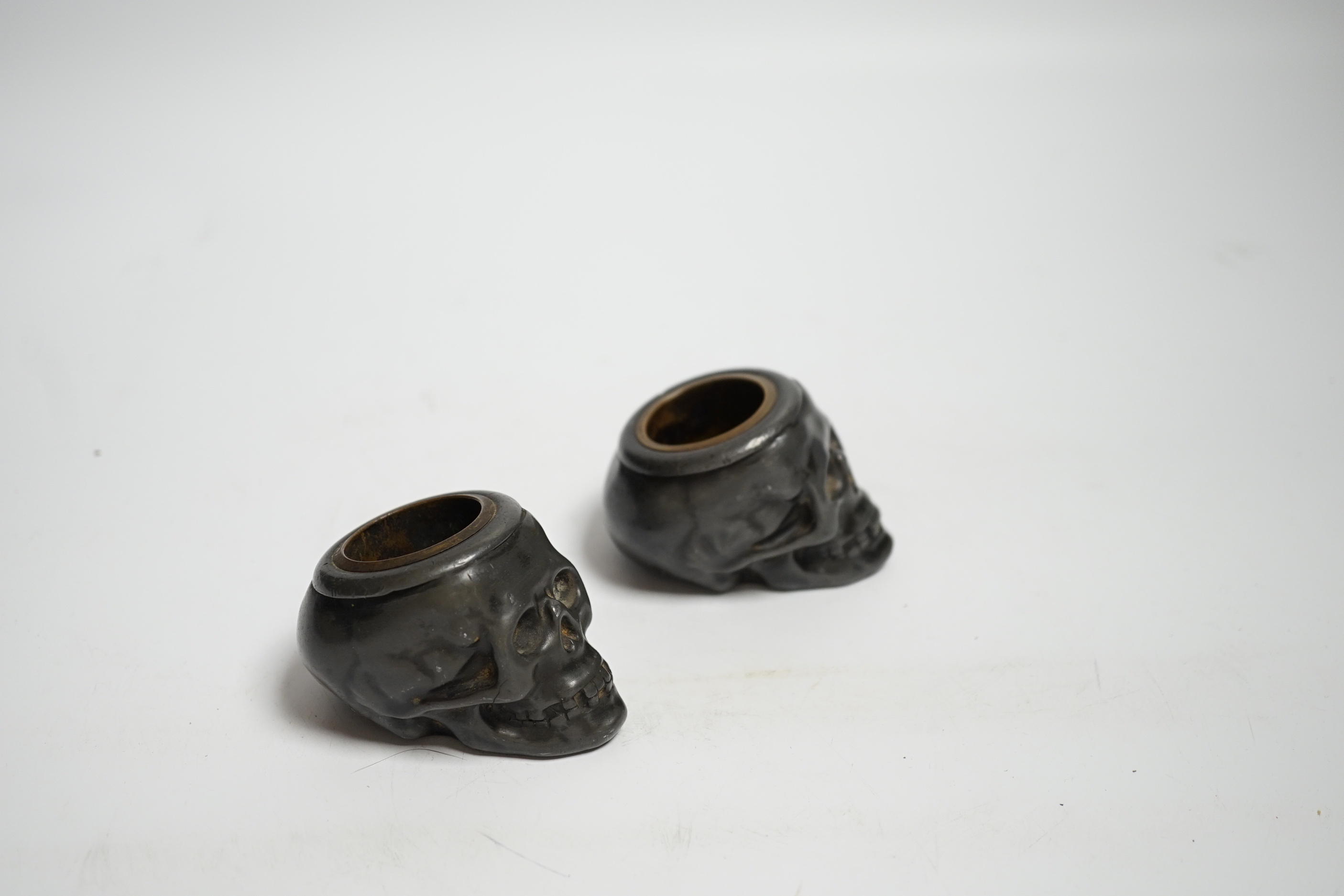 A pair of late 19th century skull shaped pewter match holders, 5cm tall***CONDITION REPORT*** - Image 2 of 3