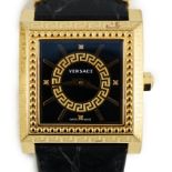 A Versace black yellow gold plated stainless steel and diamond VD25 wristwatch, in original case and