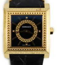A Versace black yellow gold plated stainless steel and diamond VD25 wristwatch, in original case and
