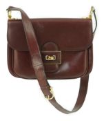 A vintage Celine horse carriage cargo flap burgundy leather shoulder bag, width 26cm, depth 3cm,