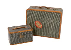 A 1940's Goyard vanity case with matching suitcase, each with tan leather mounts, the vanity case