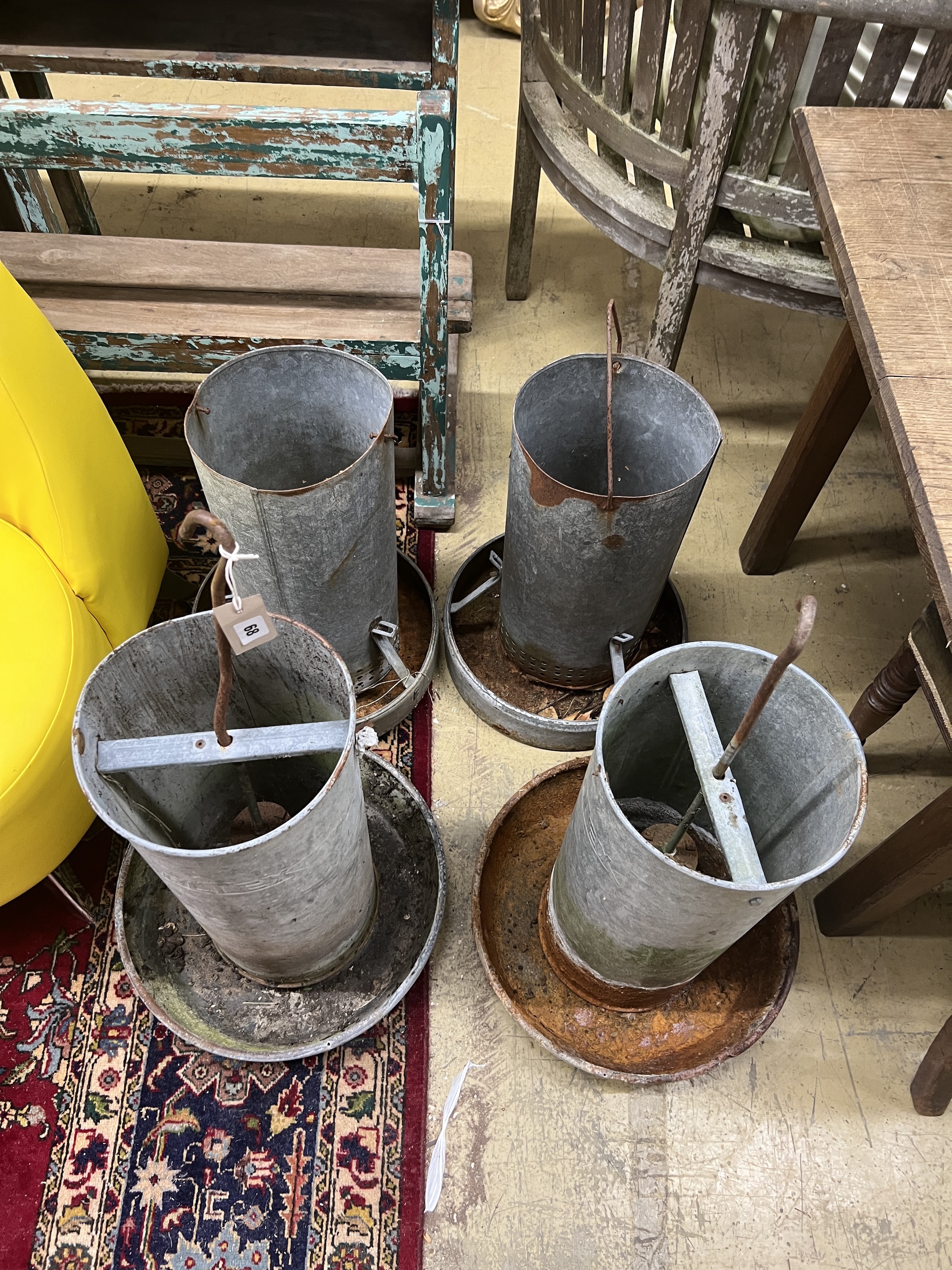 Four vintage galvanised poultry feeders, largest height 62cm***CONDITION REPORT***PLEASE NOTE:- - Image 3 of 3