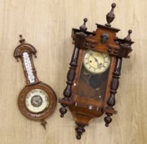 A mahogany Vienna wall clock and an aneroid barometer***CONDITION REPORT***PLEASE NOTE:- Prospective