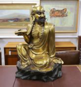 A large Chinese bronze seated figure of a Luohan, 20th century, height 72cm.***CONDITION REPORT***