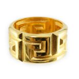 A Versace Greca gentleman's gold plated ring with 'VERSACE Made in Italy' engraved on the inside,