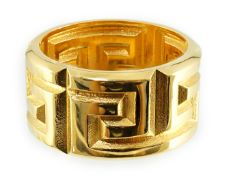 A Versace Greca gentleman's gold plated ring with 'VERSACE Made in Italy' engraved on the inside,