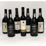 One bottle of Sandeman vintage port 1960, two bottles of Dow’s port 1980, two bottles of Warr’s port