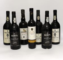 One bottle of Sandeman vintage port 1960, two bottles of Dow’s port 1980, two bottles of Warr’s port