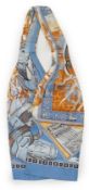 A Hermès silk cravat in ethnographic pattern, Hermes blue and brown tones, length 127cm x 18cm***