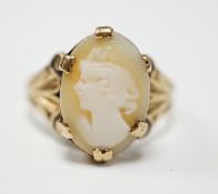 A 9ct gold and cameo shell set oval ring, size L, gross weight 2.8 grams.***CONDITION REPORT***