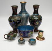 A collection of Chinese and Japanese cloisonné enamel pieces, including five vases, a ginger jar and