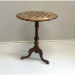 A Victorian circular walnut parquetry inlaid tripod games table, diameter 50cm, height 66cm***