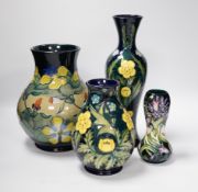 Two Moorcroft 'buttercup' vases and two other Moorcroft vases, tallest 31cm (4)***CONDITION