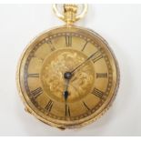 An early 20th century engraved 18k open face keyless fob watch, gross weight 38.1 grams.***CONDITION