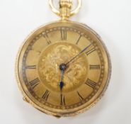 An early 20th century engraved 18k open face keyless fob watch, gross weight 38.1 grams.***CONDITION
