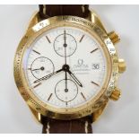 A gentleman's 18ct gold Omega Speedmaster automatic wrist watch, with three subsidiary dials, ref.
