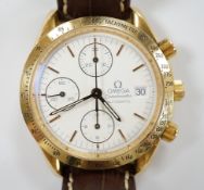 A gentleman's 18ct gold Omega Speedmaster automatic wrist watch, with three subsidiary dials, ref.