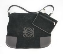 A Loewe black suede and leather shoulder bag and purse, both bag and purse feature the Loewe